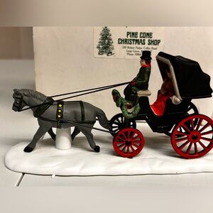 Charming Holiday Carriage with Red Wheels